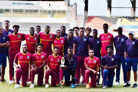 Members of the CWI Academy team and support staff pose with the series trophy after they beat Emerging Ireland in the three-match, one-day, 50 overs-a-side series on Tuesday at the Vivian Richards Cricket Ground in Antigua. (Photo courtesy of CWI Media)