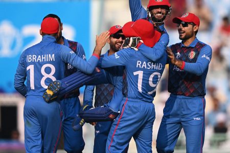 The Afghanistan players celebrate their victory over the Netherlands, their fourth at this year’s ICC World Cup.