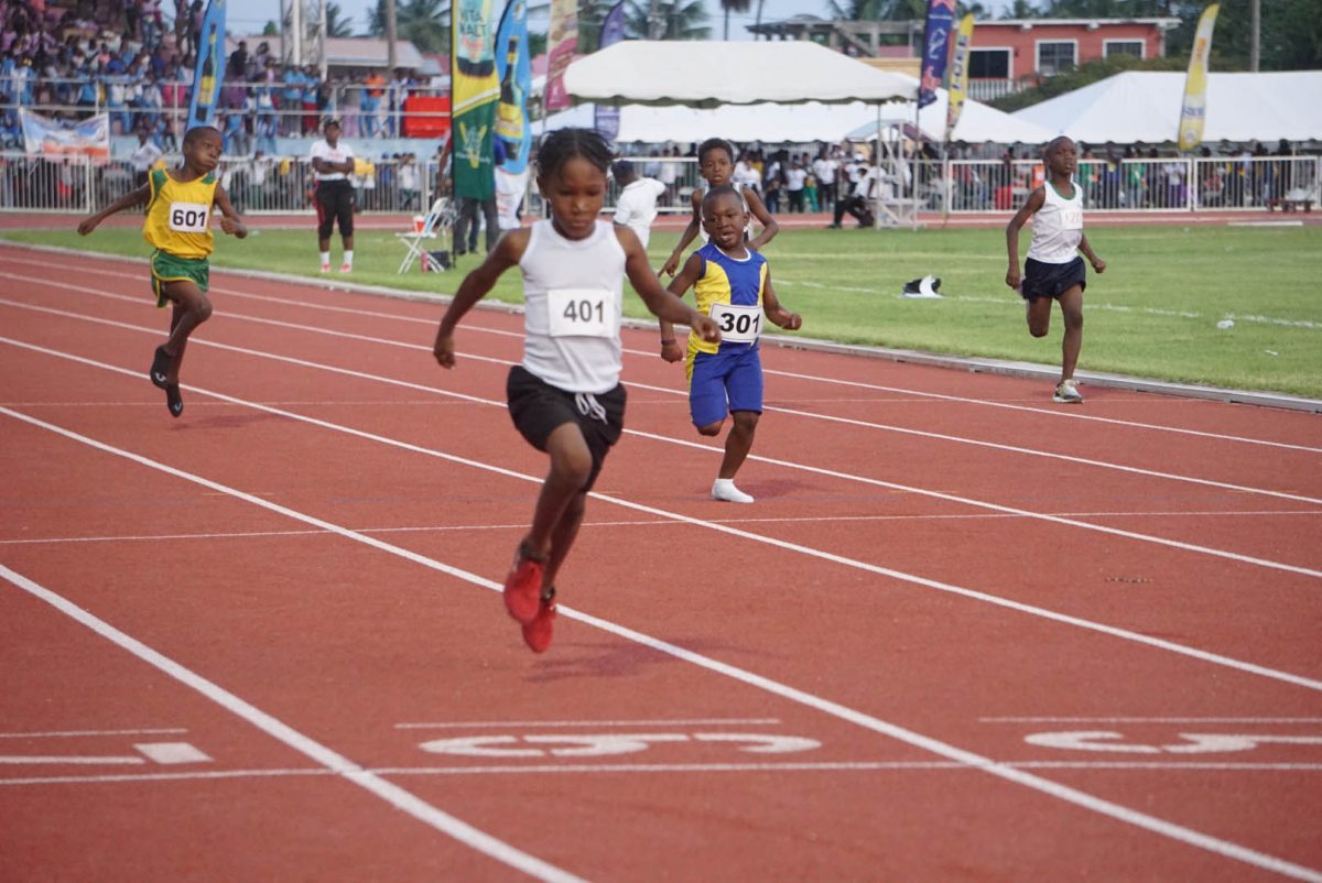 A rivalry among a pair of seven-year-olds, Jadon Bristol (#401) and Kester De Sousa (#301), has made them social media sensations. Bristol, however, defeated De Sousa in both the 100m on Wednesday and in the 150m event yesterday (Emmerson Campbell photo)