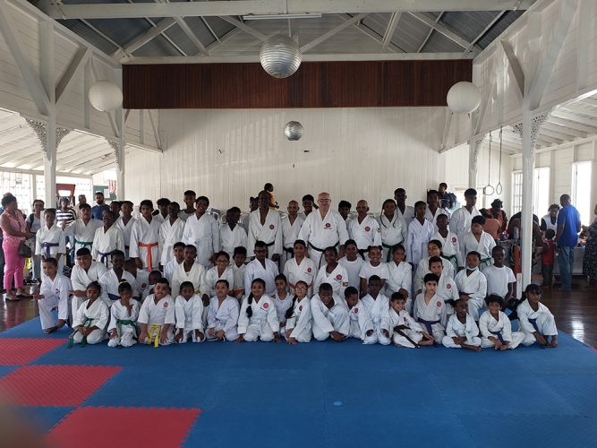 Participants and instructors pose for the camera at the recently concluded ASK
grading examinations on November 5th at the YMCA Dojo on Thomas Lands.
