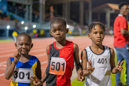 The top three finishers from the boy’s u-8 80m final are, from left, Kester DeSouza, Akaziah Semple, and Jadon Bristol (Photo compliments of the Ministry of Education)