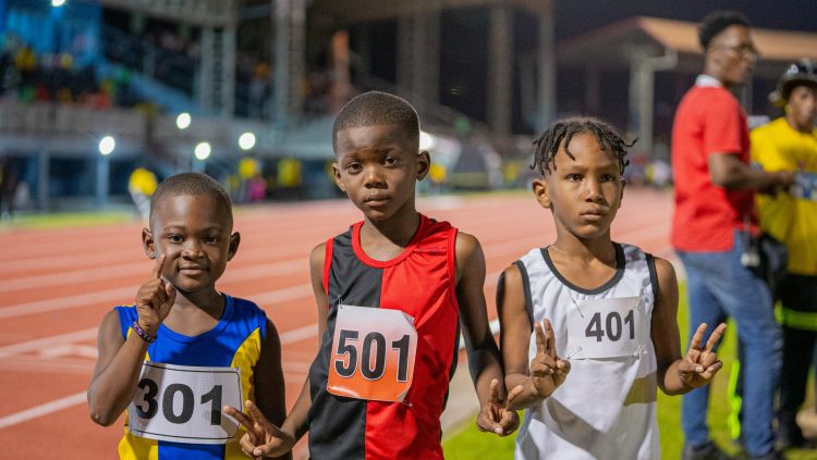 The top three finishers from the boy’s u-8 80m final are, from left, Kester DeSouza, Akaziah Semple, and Jadon Bristol (Photo compliments of the Ministry of Education)