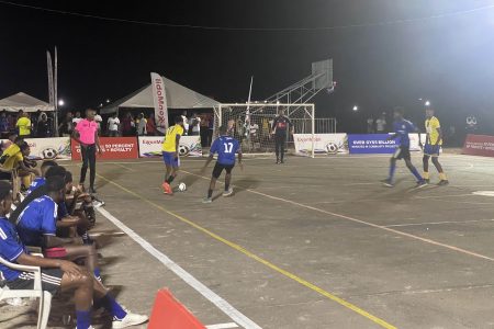 A scene from the Haynes Ballers and West Side Ballers encounter in the ExxonMobil/New Entertainment Futsal Championship at the Retrieve Hard Court, Linden