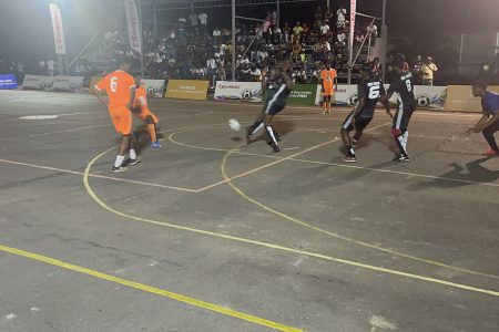 Action between Hardknocks and Young Gunners at the Retrieve Tarmac in the New Era Futsal Championship