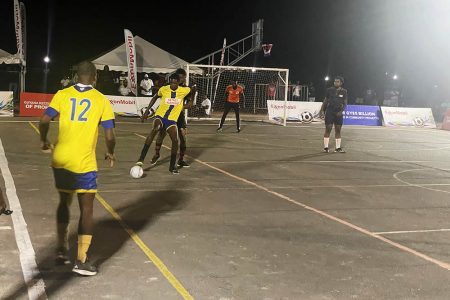 Action between LA Ballers and Haynes Ballers at the Retrieve Tarmac in the New Era Futsal Championship
