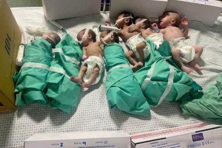 Newborns are placed in bed after being taken off incubators in Gaza’s Al Shifa hospital after power outage, amid the ongoing conflict between Israel and the Palestinian Islamist group Hamas, in Gaza City, Gaza in this still image obtained by REUTERS.