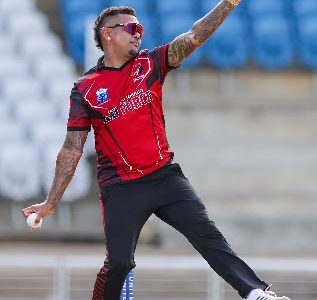 Veteran off-spinner Sunil Narine sends down a delivery during his three-wicket haul in the Super50 Cup final yesterday (Photo courtesy CWI Media)