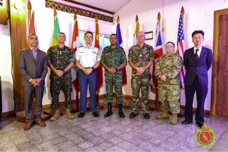 Chief of Staff of the Guyana Defence Force Omar Khan (centre) and officials at the Military Partners Day celebration 