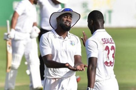 Akeem Jordan (left) congratulates fellow West
Indies A pacer, Jayden Seales, during play against
hosts South Africa A on the first day of the first
“Test” in Benoni (Photo courtesy of CWI Media)