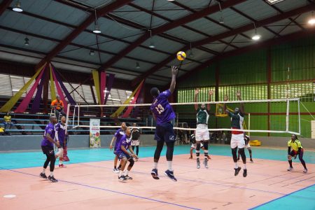 A Yelyco player goes aerial in their match against the Demerara men’s team.