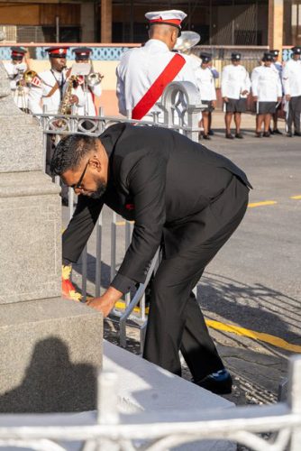 President Irfaan Ali laying a wreath at the Cenotaph Monument.