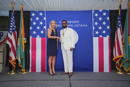 President Irfaan Ali (right) with the new US Ambassador to Guyana, Nicole D. Theriot at the reception. (Office of the President photo)