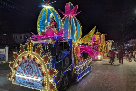 Motorcade night: The Bushlot Vishnu Mandir’s float seen here yesterday with several other illuminated vehicles in the background as the Guyana Hindu Dharmic Sabha held its annual Diwali motorcade in Georgetown. (Tourism Guyana photo)