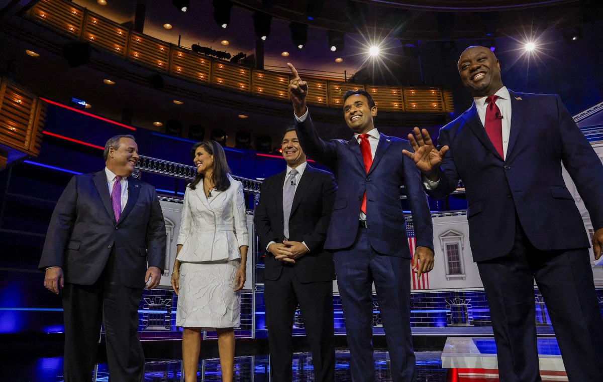 Former New Jersey Governor Chris Christie, former South Carolina Governor Nikki Haley, Florida Governor Ron DeSantis, former biotech executive Vivek Ramaswamy and U.S. Senator Tim Scott (R-SC) pose together at the third Republican candidates' debate of the 2024 U.S. presidential campaign hosted by NBC News at the Adrienne Arsht Center for the Performing Arts in Miami, Florida, U.S. November 8, 2023. REUTERS/Marco Bello