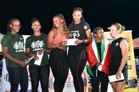 Tonnica Dey and Semonica Duke (atop the podium) repeated as champions in the Team Women’s events.