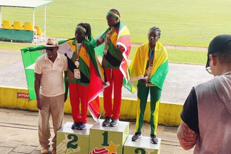 Guyana one-two! Marissa Thomas (centre) and Esther Mckinnon (left) landed Gold and Silver medals in the
Girls 1500m event.