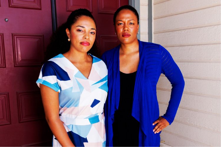 Ariana and Nakisha Hester pose for a picture outside their mother’s home in Bonsall, California, U.S., July 28, 2023.  They are weighing whether to join the litigation over hair relaxers on behalf of their late mother, Patrice Hester. REUTERS