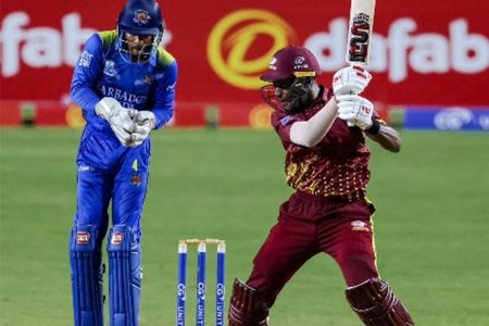 Opener Justin Greaves hits though the off-side during his unbeaten 95 against
Barbados Pride on Thursday night. (Photo courtesy CWI Media) 