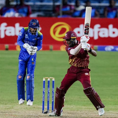 Opener Justin Greaves hits though the off-side during his unbeaten 95 against
Barbados Pride on Thursday night. (Photo courtesy CWI Media) 