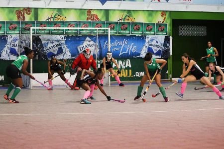 Action in the female category of the Diamond Mineral Water Hockey Festival last year at the Cliff Anderson Sports Hall.
