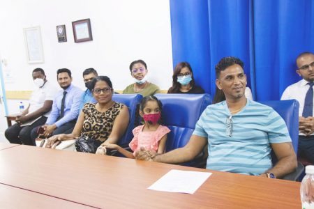 The patient and her family yesterday at the press conference