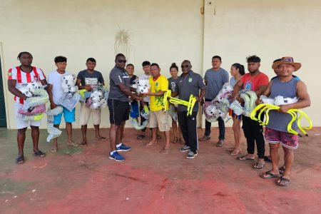 GFF Technical Director Bryan Joseph presented the equipment to RFA President Norbert Williams in the presence of Competitions Director Troy Peters and other members of the local association