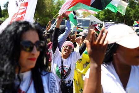 FILE PHOTO: Supporters of South Africa's ruling African National Congress (ANC) and various political parties including civil society groups gather in solidarity with the Palestinian people outside the Israeli embassy in Pretoria, South Africa, October 20, 2023. REUTERS/Siphiwe Sibeko/File Photo