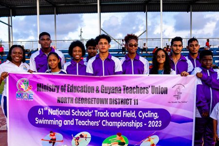 North Georgetown (District 11) were ruthless in their defence of the Swimming championship
at the `Nationals’ yesterday. They won 32 Gold Medals, 5 Silvers and 2 Bronzes overall.  Here, the winning team poses with a banner.