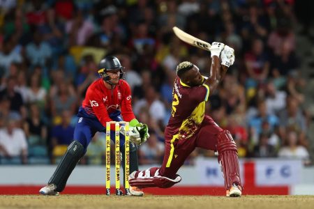 Cow Corner! Andre Russell dispatches a delivery into the stands over the
mid-wicket region during his vital cameo (photo compliments of ESPN Cricinfo)
