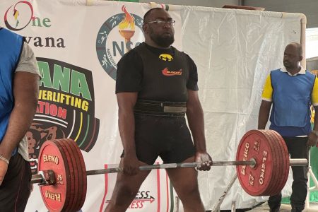 Fazim Abdool, lifting in the men’s 120kg class, broke the open and masters’ deadlift national records after pulling a mammoth 296kg (652 lbs) off the platform. His squat of 310kg (682 lbs) and bench press of 210kg (462 lbs) and subsequent total of 816kg (1795 lbs) enabled him to be rewarded with the coveted Best Lifter trophy yesterday. (Emmerson Campbell photo)