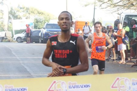 Three in three! Trinidad’s Nicholas Romany was the toast of this weekend’s Run Barbados festivities after he completed an unprecedented ‘Triple Crown’, winning the PWC Fun Mile, the Casuarina 10K, and the Sand Dunes Half Marathon event.