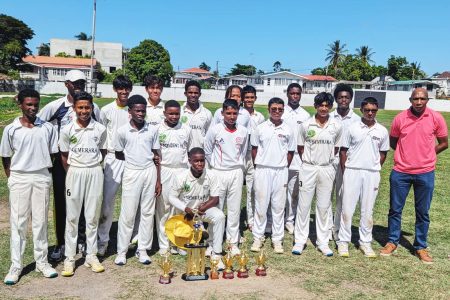Winner of the DCB U-15 50-over
tournament, GCA, pose with their trophy