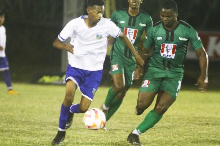 A scene from the St. Benedict (green) and DC Caesar Fox encounter in the KFC Goodwill Football Championship
