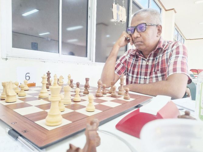 Loris Nathoo playing in the 2023 Guyana National Chess Championship
