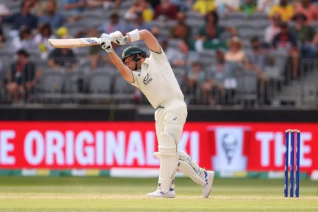 Steven Smith drives through the onside as he leads the Australian
second innings charge with an unbeaten 43
