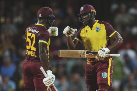 The combination of Rovman Powell (left) and Andre Russell will be critical to the success of the West Indies today
