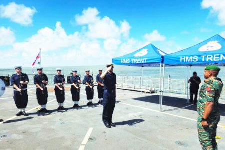 Chief of Staff of the Guyana Defence Force, Brigadier Omar Khan (right) taking the salute
(HMS Trent X page)
