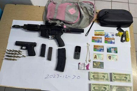 The rifle and other items that were found (Police photo)
