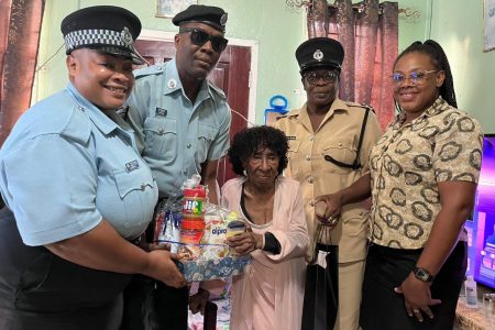 Edna Stephenson (centre) during the visit. (Police photo)