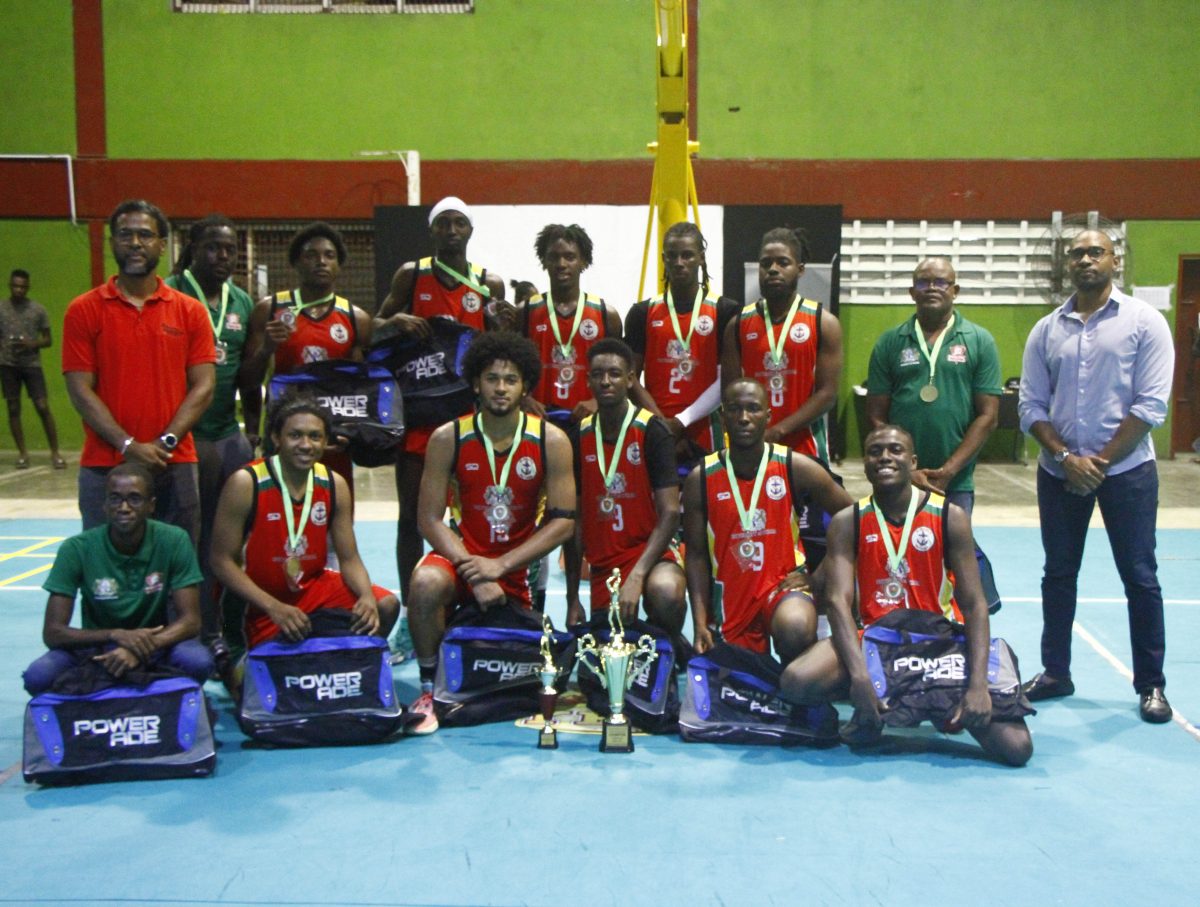 The victorious UG Trojans pose with their trophy, medals and gifts