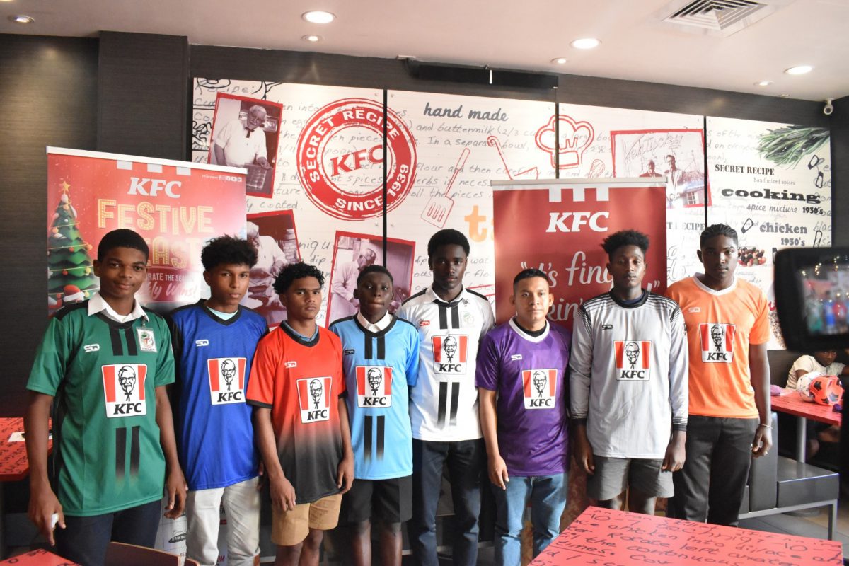 The local team representatives pose with the various kits to be used during the KFC Goodwill Schools Football Tournament