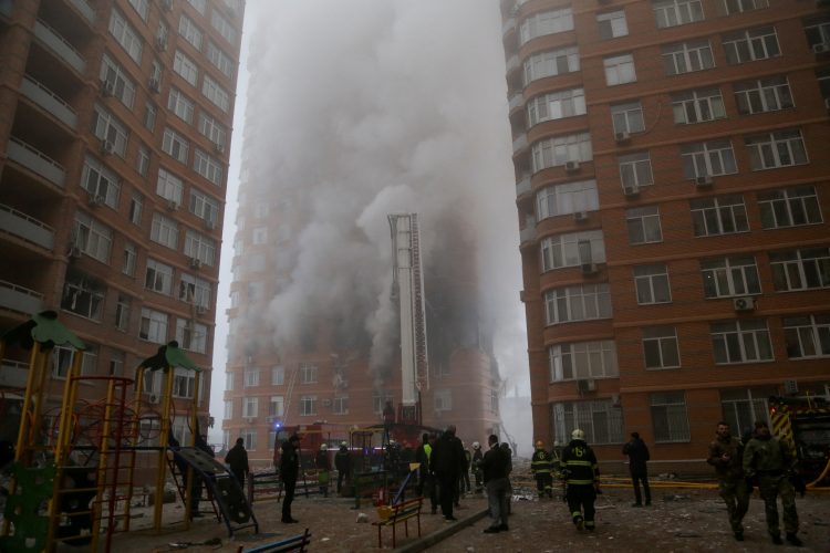 Rescuers work at the site where a residential building was damaged during a Russian missile and drone strike, amid Russia's attack on Ukraine, in Odesa, Ukraine December 29, 2023. REUTERS/Serhii Smolientsev