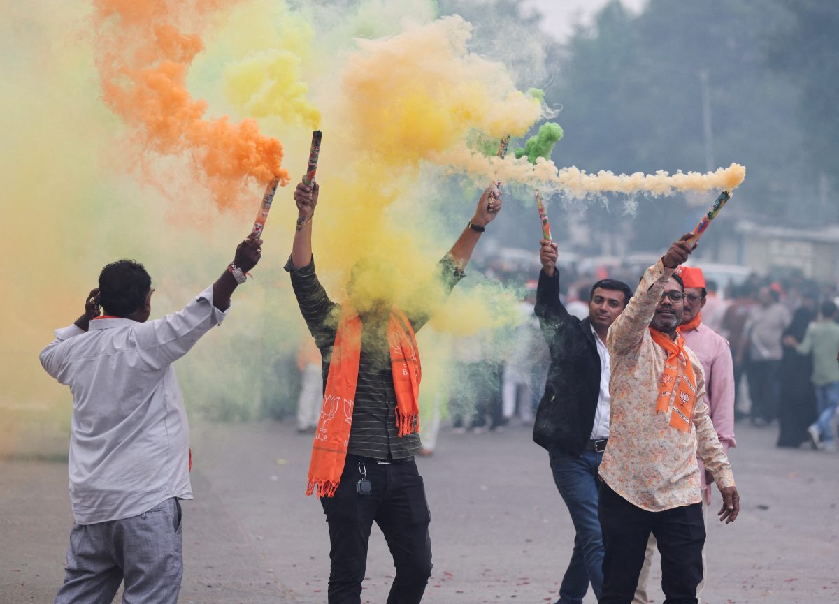 FILE PHOTO: Supporters of India’s ruling Bharatiya Janata Party (BJP) celebrate after winning three out of four states in key regional polls outside the party headquarters in Ahmedabad, India, December 3, 2023.REUTERS/Amit Dave/File Photo