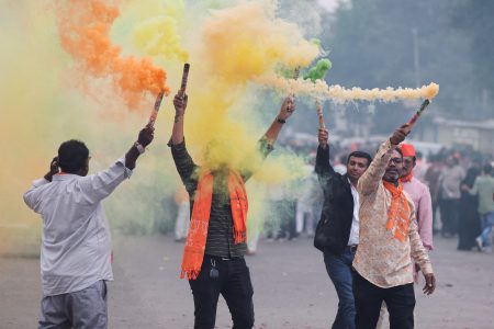 FILE PHOTO: Supporters of India's ruling Bharatiya Janata Party (BJP) celebrate after winning three out of four states in key regional polls outside the party headquarters in Ahmedabad, India, December 3, 2023.REUTERS/Amit Dave/File Photo