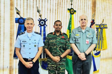 Cos brazil Brigadier Omar Khan (centre) with the two officials (GDF photo)