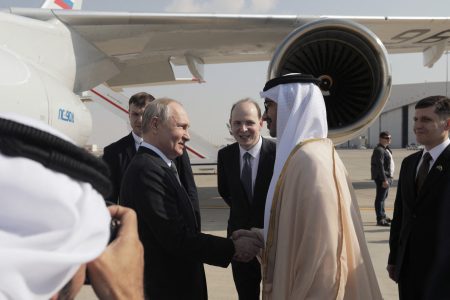 Russian President Vladimir Putin is welcomed by Minister of Foreign Affairs of the United Arab Emirates Sheikh Abdullah bin Zayed bin Sultan Al Nahyan upon arrival at the Abu Dhabi International Airport, United Arab Emirates December 6, 2023. Sputnik/Andrey Gordeev/Pool via REUTERS