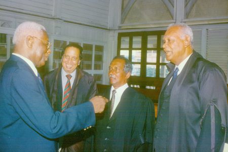 Senior Counsel Rex McKay (right) with from left: late President Desmond Hoyte, Eddie Luckhoo and the late Winston Murray. (SN file photo)
