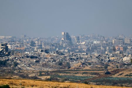 A view of damaged buildings in Gaza, after a temporary truce between Israel and the Palestinian Islamist group Hamas expired, as seen from southern Israel, December 2, 2023. REUTERS/Alexander Ermochenko