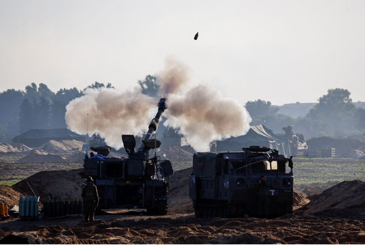 Israeli soldiers firing rockets Creator: AMIR COHEN | Credit: REUTERS