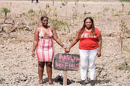 Allottees on their East Bank Demerara plot recently